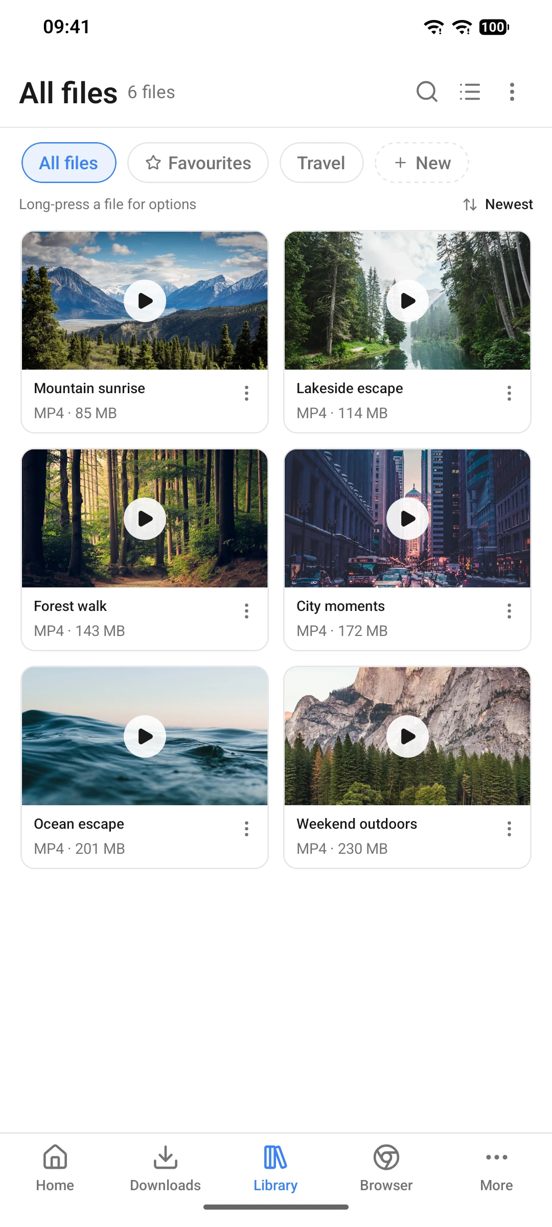 9xbuddy Android Library showing finished media in a two-column grid with favourites and collection filters